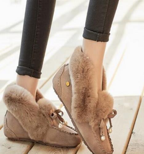 冬款靴子如何搭出时尚感：教你靴子潮流搭（图）