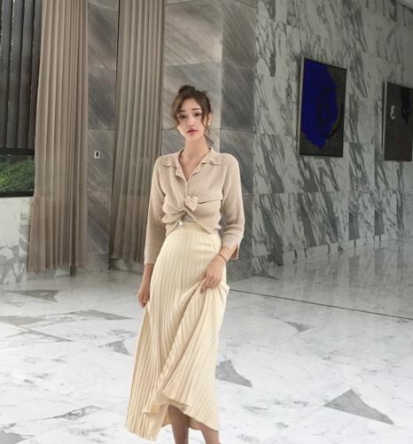 冬日连衣裙该如何搭配才能时尚又保暖（图）