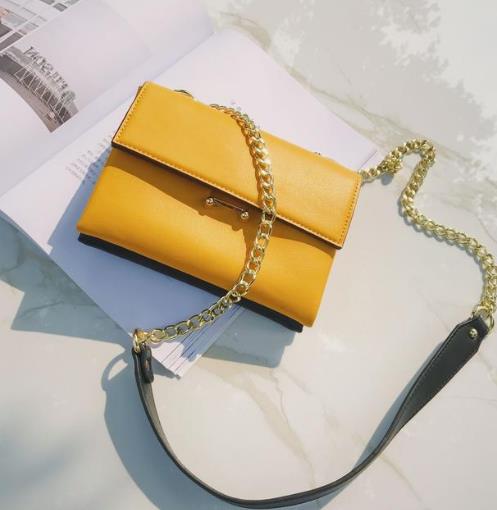 2018彰显时尚潮流的纯色花朵手提斜跨包推荐（图）