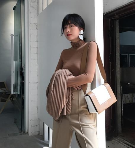 秋冬你的内搭选对了吗：针织衫保暖又显气质（图）