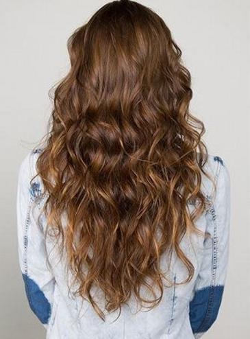 降温必备大毛领连帽长款羽绒服：时尚又显瘦（图）