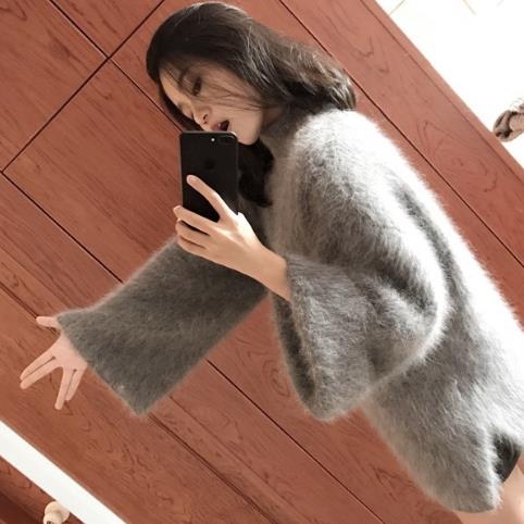 时尚个性的阔袖宽松粗线毛衣搭配示范（图）