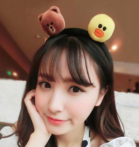 这几款青春甜美的镶钻假耳环发箍搭配示范（图）