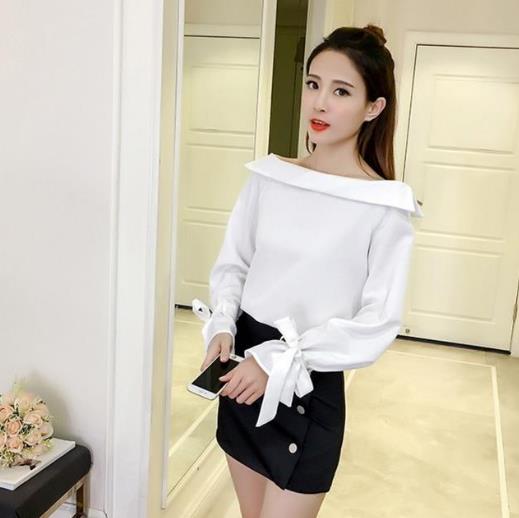 包臀裙搭配荷叶花边白色衬衫:凸显时尚气质(图) 包臀裙搭配荷叶花边白色衬衫:凸显时尚气质(图)