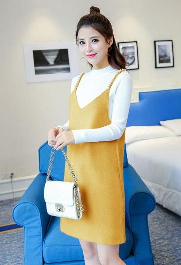 手拿包搭配高腰OL两件套背心裙：十足的OL范儿（图）