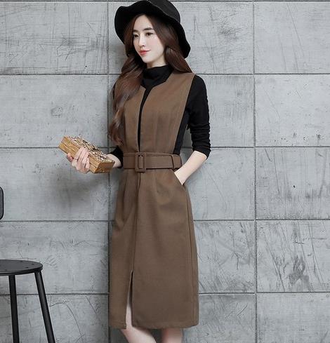 手拿包搭配高腰OL两件套背心裙：十足的OL范儿（图）