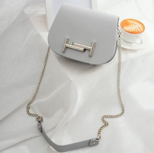5款单肩撞色链条小方包搭配：打造简约欧美范（图）