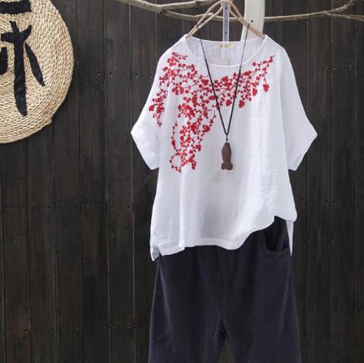 夏季新品刺绣棉麻短袖套头上衣：简约又俏皮（图）