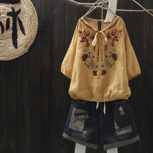 夏季新品刺绣棉麻短袖套头上衣：简约又俏皮（图）