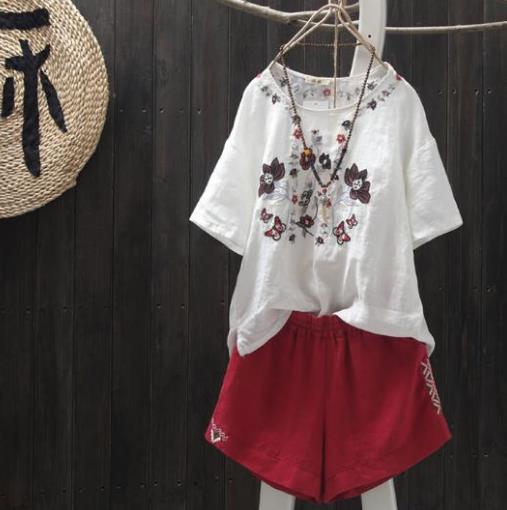 夏季新品刺绣棉麻短袖套头上衣：简约又俏皮（图）