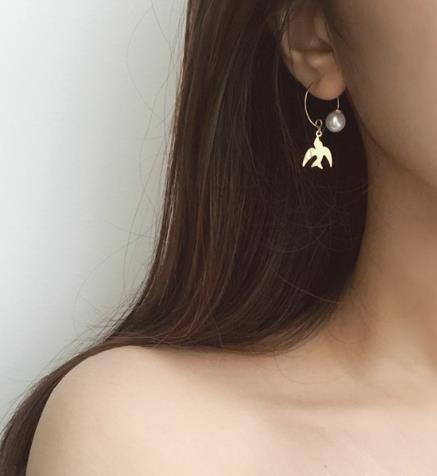 冬天耳环怎么搭配 时髦耳环让你美丽动人（图）