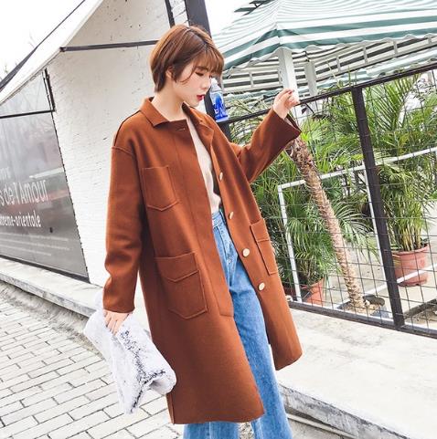 中长款格纹毛呢外套搭配：演绎知性帅气（图）