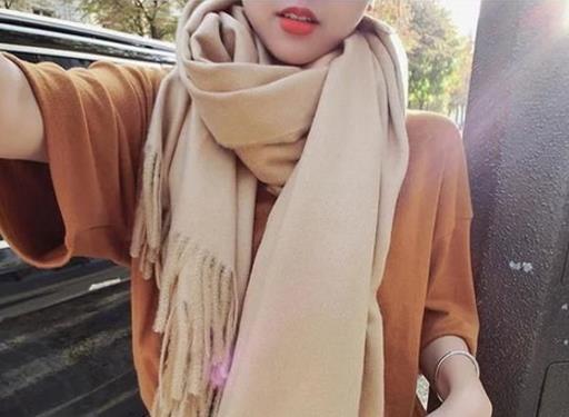 围巾怎么选:根据大衣颜色选围巾(图) 围巾怎么选:根据大衣颜色选围巾(图)