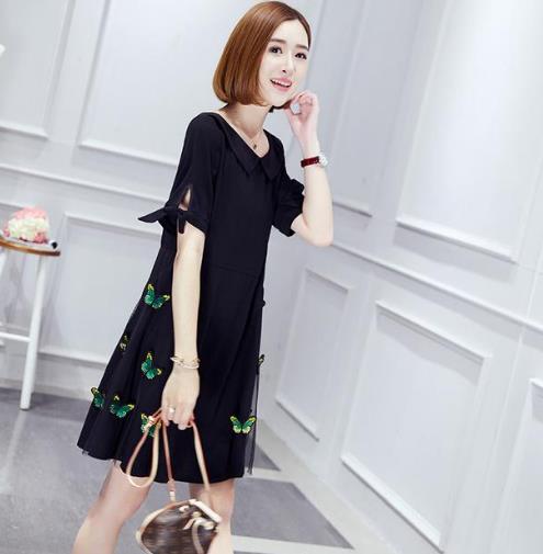 女人一定要有一条剌绣连衣裙:复古显气质(图) 女人一定要有一条剌绣连衣裙:复古显气质(图)