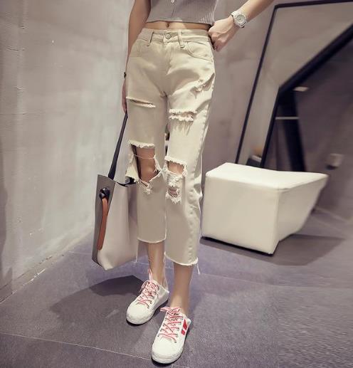 牛仔裤现在这么穿才时髦显瘦 你穿对了吗（图）