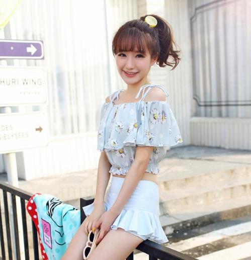 显瘦利器连体泳衣：性感迷人泳衣推荐（图）