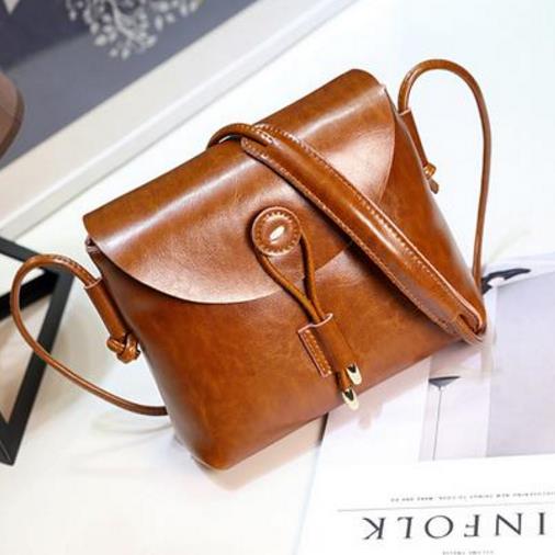 每个女生都应该有一款百搭又时尚的斜挎包（图）