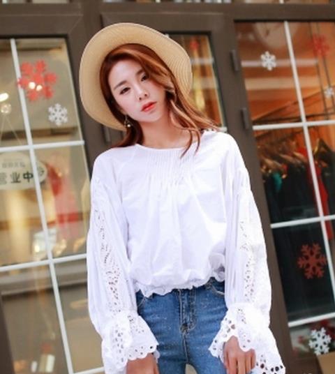 蕾丝衫这样搭 让你春意十足（图）