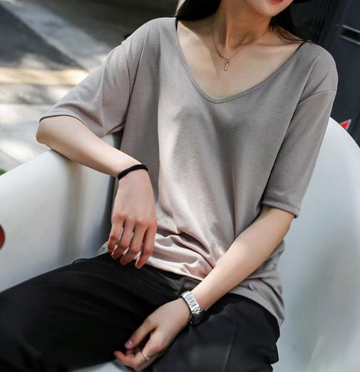 今年流行T恤这样穿 这5款T恤时尚显瘦还有范（图）