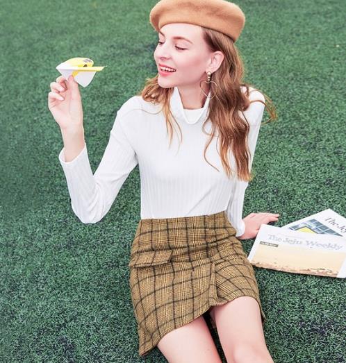 春季新款针织半身裙这么穿才好看（图）