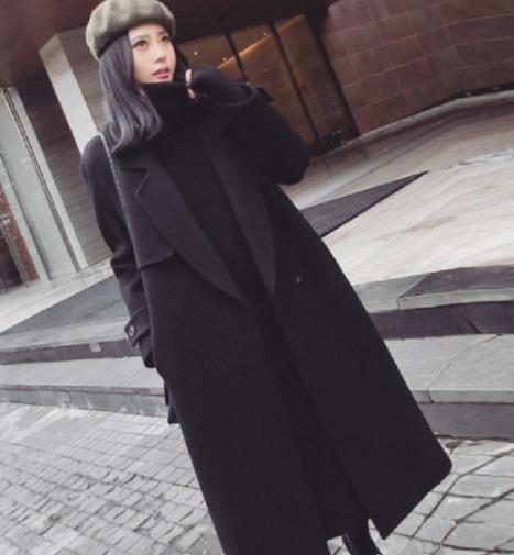 用大衣搭配长裙就能穿出大气优雅（图）
