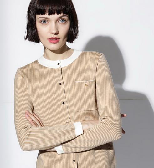 开春时髦出街 背心开衫更胜一筹（图）