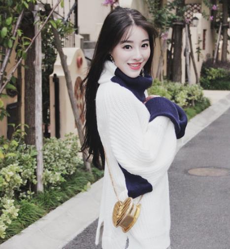 适合胖MM穿的一字领显瘦塑身针织衫(图) 适合胖MM穿的一字领显瘦塑身针织衫(图)