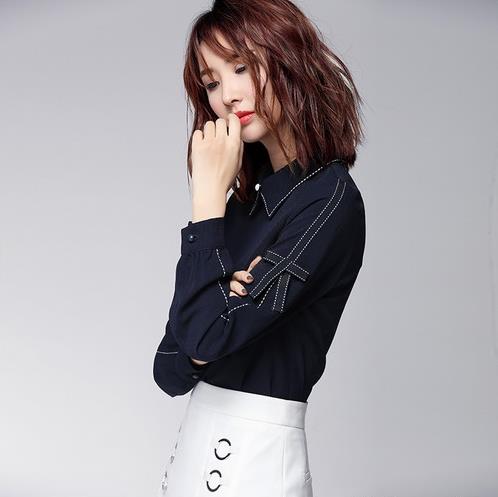 条纹衬衫搭配裤装：彰显利落干练的气质（图）