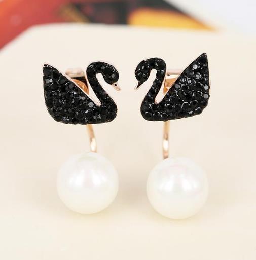 戴上修饰脸型的耳钉来提升你的气质(图) 戴上修饰脸型的耳钉来提升你的气质(图)