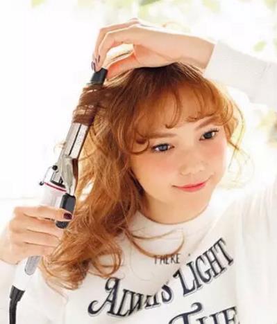 教你侧边马尾辫扎法 演绎春日浪漫（图）