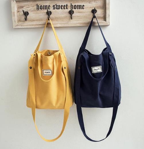 现在最流行简约大方斜跨帆布包搭配示范(图) 现在最流行简约大方斜跨帆布包搭配示范(图)