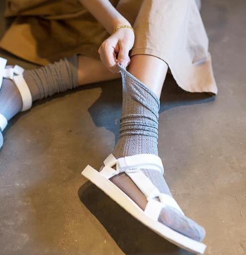 时尚又性感就穿新款镂空渔网堆堆袜（图）