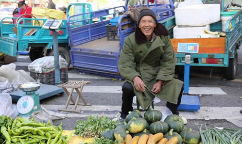 黑龙江的三伏天：市民裹棉袄羽绒（组图）