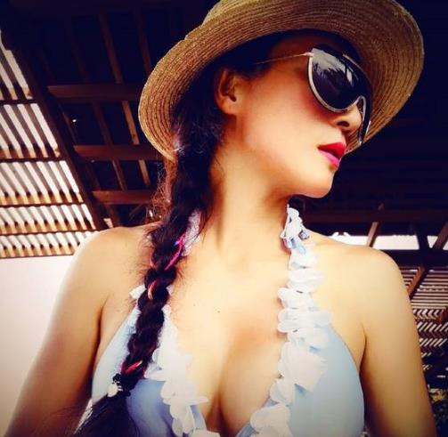 50岁健身女神晒美照：比基尼傲人身材,旅游组图美照