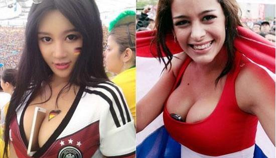 美女球迷胸夹手机：世界杯现场观战（图）