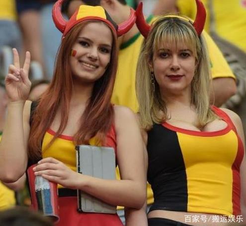 世界杯26日美女图:美女球迷专注观战 挥舞旗帜呐喊（图）