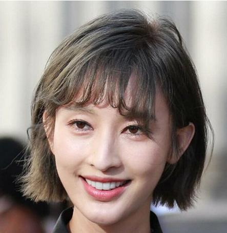 张俪朱镇模恋情曝光 长脸御姐百变短发减龄似少女