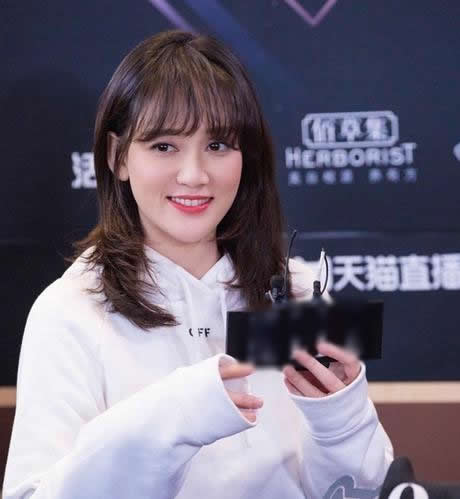 刘海半长不短怎么办