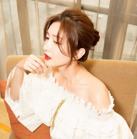 刘海半长不短怎么办