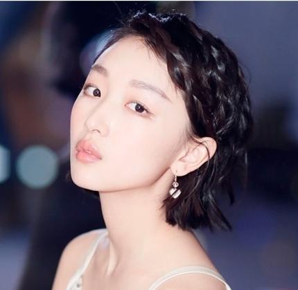 刘海半长不短怎么办